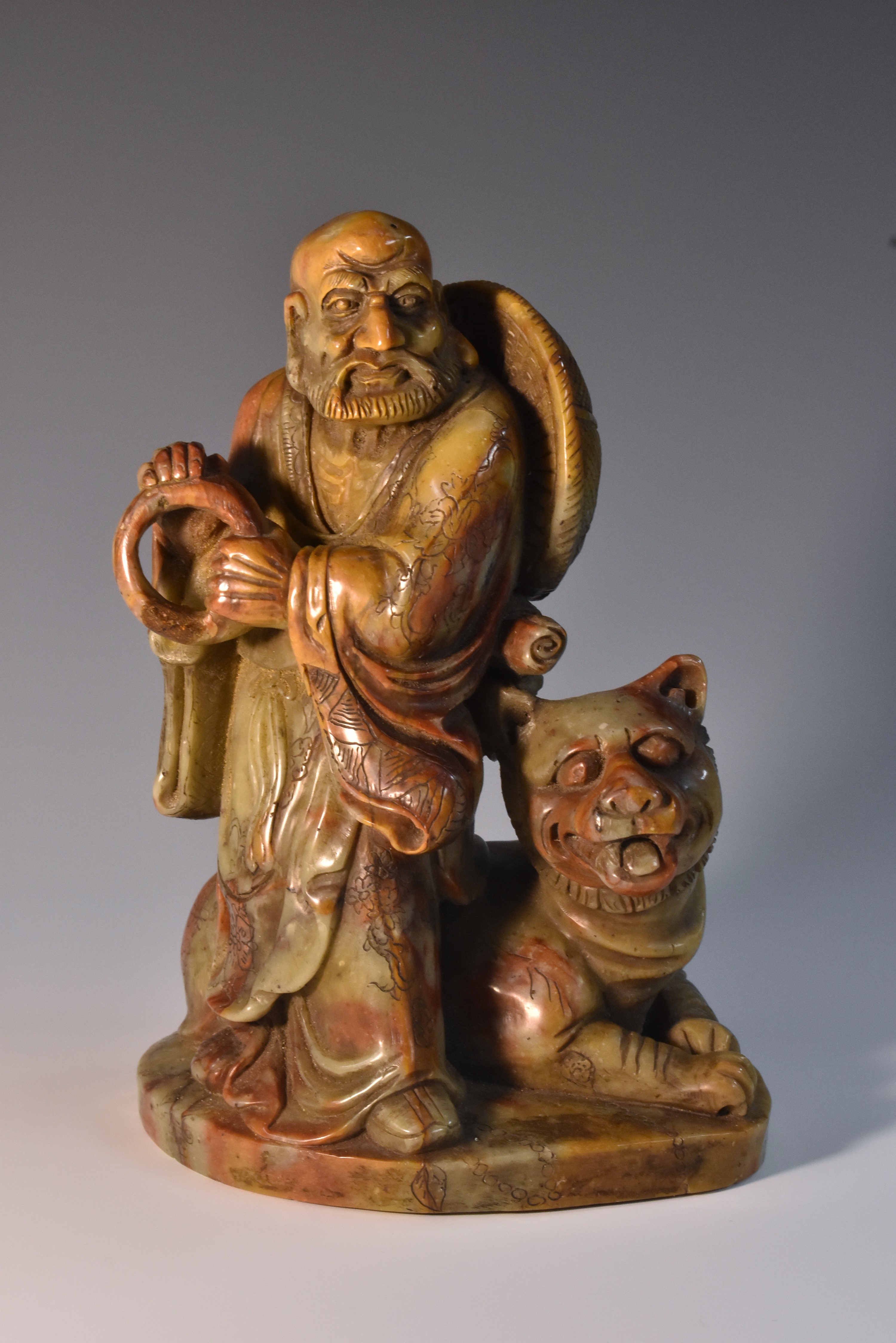 A Chinese soapstone carving, of an emaciated elder,