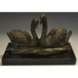 French School, a brown patinated cold cast sculpture, of two swans, veined marble base, 14.