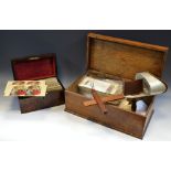 An early 20th century stereoscopic viewer and cards, the cards with local scenes Matlock, The Peak,