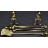 A set of three 19th century brass fireside implements,