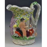 A Jones and Walley relief moulded gypsy jug, in colours, black line borders, 22cm high,