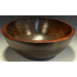 A 19th century turned wooden bowl,