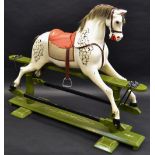 A good Victorian wooden rocking horse, in dapple grey, green sledge base,