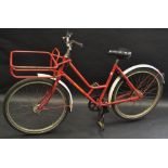 A Royal Mail Pashley delivery bicycle, painted red,