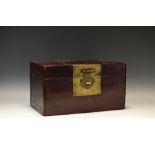 A Chinese red leather document box, brass catch, 27cm wide,
