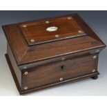 A Victorian rosewood sarcophagus shaped stationery box, mother-of-pearl tablet, ball feet,