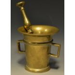 An 18th century bronze mortar, flared rim, two angular handles, 11.5cm high, c.