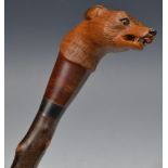 A blackthorn walking stick, well carved by Stan Randall, with fox mask,