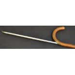 A gentleman's novelty horse measuring walking stick, the shaft and curved handle enclosing a scale,