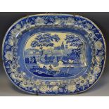 A large Staffordshire blue and white British Scenery meat plate, with well, wild rose border,
