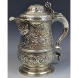 A George III baluster tankard, three-quarter girdle, domed cover, pierced chair back thumb rest,