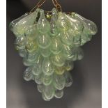 An unusual glass ceiling light, of tapering form,