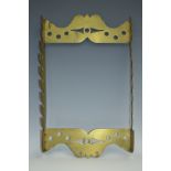 A George III brass wall hanging tavern church warden pipe rack, shaped and pierced borders,