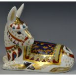A Royal Crown Derby paperweight, Donkey, seated,