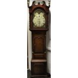 A 19th century mahogany longcase clock, the 35cm painted arched dial with Roman numerals,