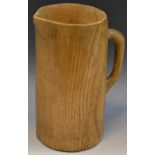 A 20th century rustic oak jug ,