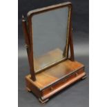 A George II/early George III parcel-gilt mahogany dressing glass, rounded rectangular tilting plate,