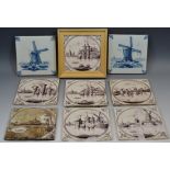Two Dutch delft tiles, decorated in cobalt blue with windmills, 13cm square; six Dutch tiles,
