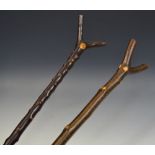 A blackthorne thumb stick, 115cm long; another,