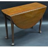 A George III mahogany oval drop leaf dining table, pad feet, 71cm high, 112cm wide, c,