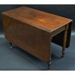 An early Victorian mahogany rounded rectangular drop leaf table, moulded top, turned legs,