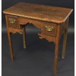 A George III oak lowboy, shaped moulded rectangular top, shaped apron, two deep short drawers,