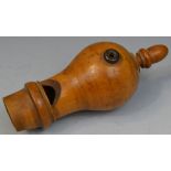 Treen - a 19th century boxwood bird call, turned acorn shaped finial,