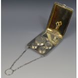 An Art Deco silver and gold case, possibly American, finger chain,
