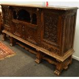 A 19th-Century-Neo-Renaissance style dining room suite sideboard, centred with an open niche,