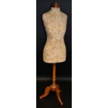 An early 20th century mannequin, copper top, tripod base, circa 1910/1920,