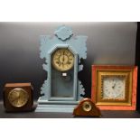 An Ansonia mantel clock; an Art Deco mantel clock; an Art Nouveau inlaid clock;