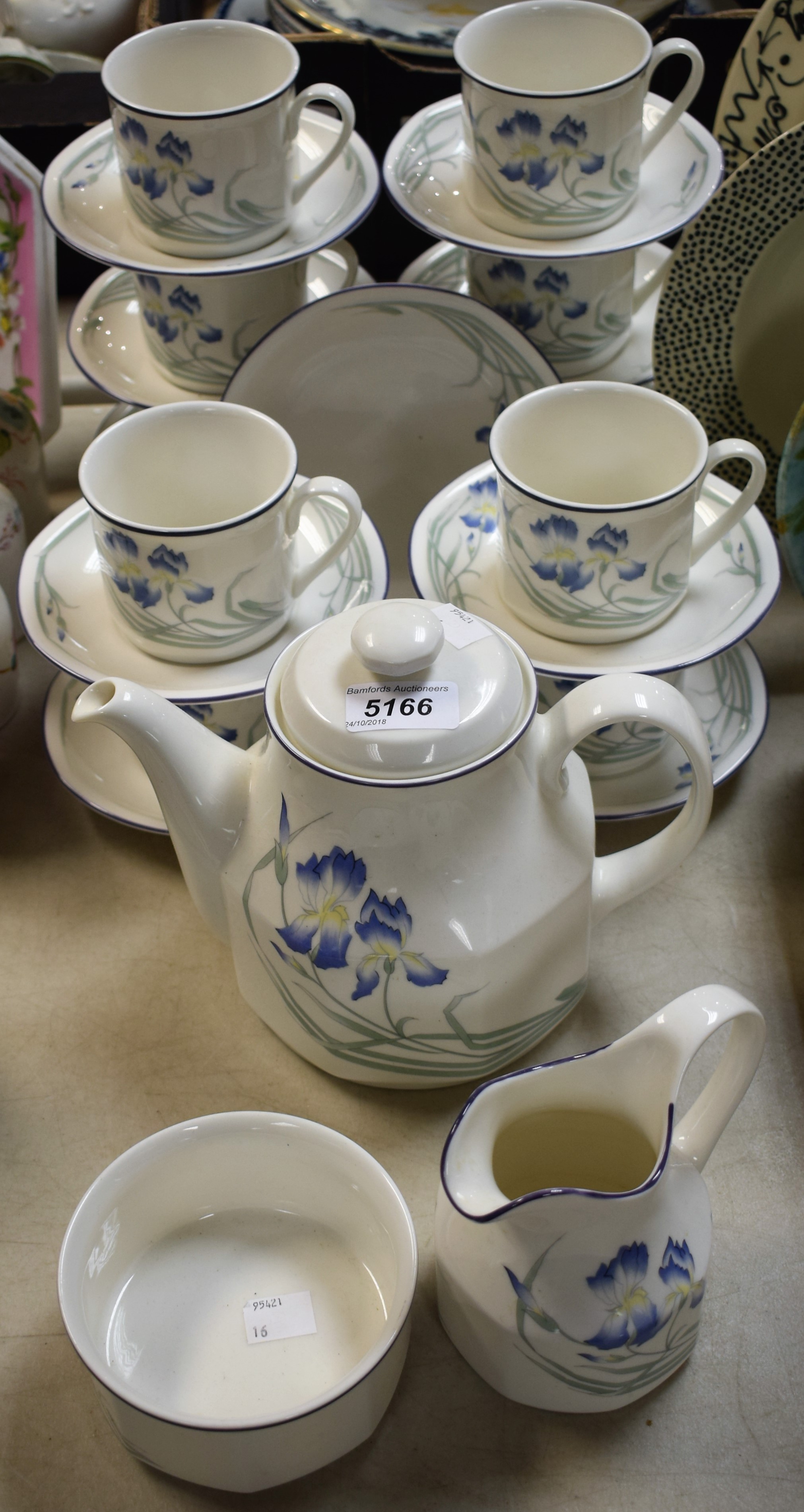 A Royal Doulton Minerva pattern tea service, comprising cups, saucers, teapot, milk jug, sugar bowl,