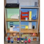 An Ikea two section dolls house with assorted furniture and accessories