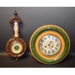 An early 20th century Junghans sunburst clock, painted circular dial, Arabic numerals,