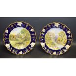 A pair of Royal Crown Derby Named View vine edge plates, decorated with Lions Head Rock, Derbyshire,