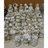 Ceramics - 19th century continental figures, children with animals, playing tennis,