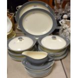 Ceramics - a Wedgwood mid-20th century dinner service for six, plain border,