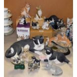 A Sherratt and Simpson resin model of a cat; others similar resin cat models in various poses;