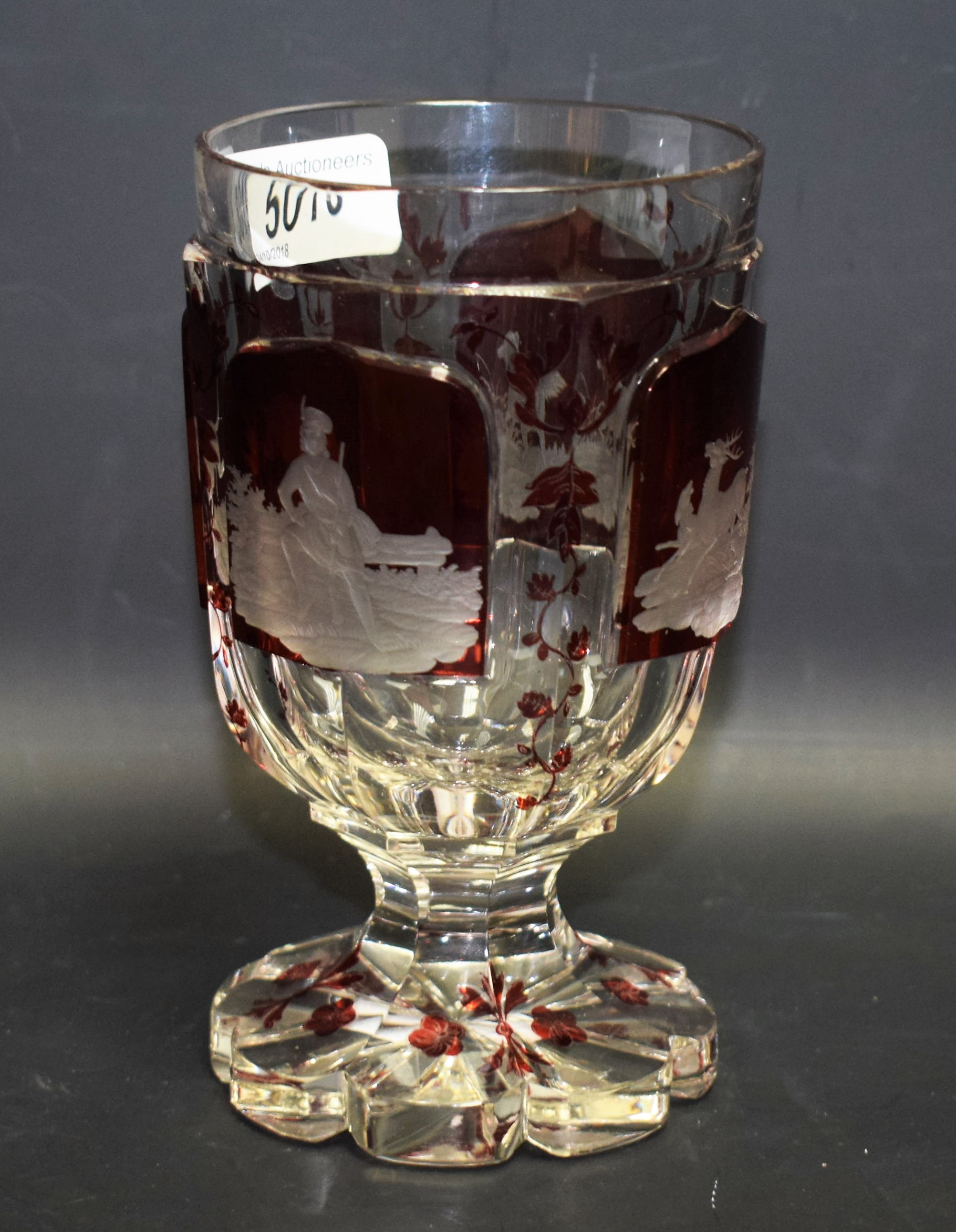 A 19th century Bohemian flashed glass goblet, engraved with hounds and stag, 14cm high, c.