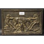 A cast iron rectangular plaque, The Law Suit, with three figures and a bull in relief,