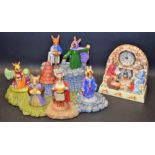 A Royal Doulton Bunnykins King Arthur group, including Merlin, Queen Guinevere, Sir Galahad, stand,