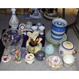 A TG Green Cornish Ware storage jar and cover; a Poole biscuit barrel;