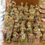 Ceramics - 19th century continental figures including children, dandies, maidens, spill vases, etc,