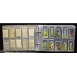 Cigarette Cards - album of football and cricket cards,