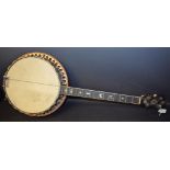 Musical Instruments - a banjo by Garnes and Mullins, London,