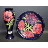 Ceramics - a Moorcroft Anemone pattern baluster vase, blue ground,