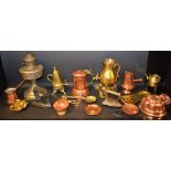Metalware - a Middle Eastern copper coffee pot; a brass spirit warmer;