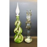 A Murano clear glass sculpture, two entwined figures; a 1960's spiral glass bottle vase,