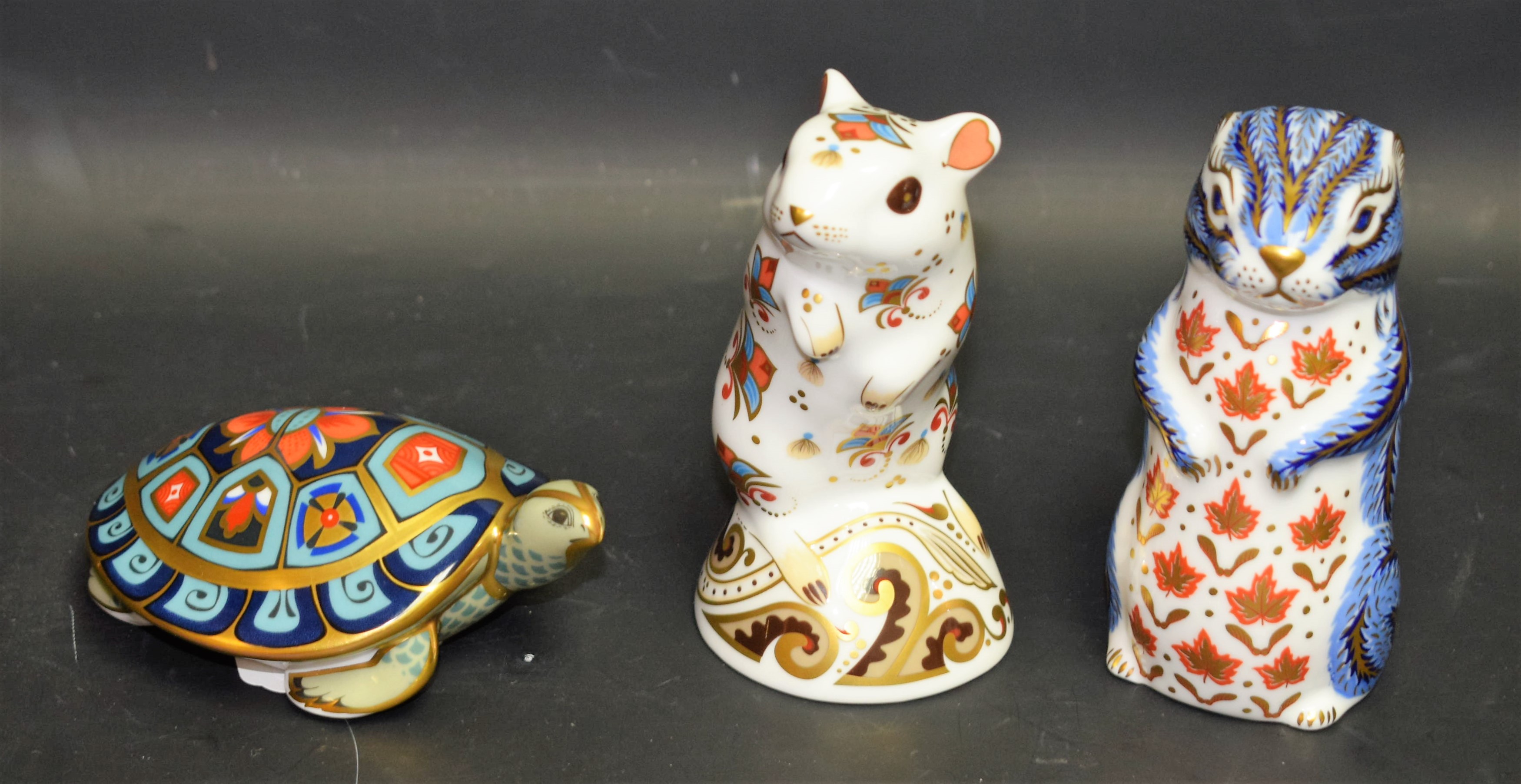 A Royal Crown Derby paperweight, Gerbil, gold stopper; others, Chipmunk and Terrapin,