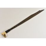 A Dayak mandau or parang llang sword, 52cm shaped blade inlaid with brass roundels, bone grip,